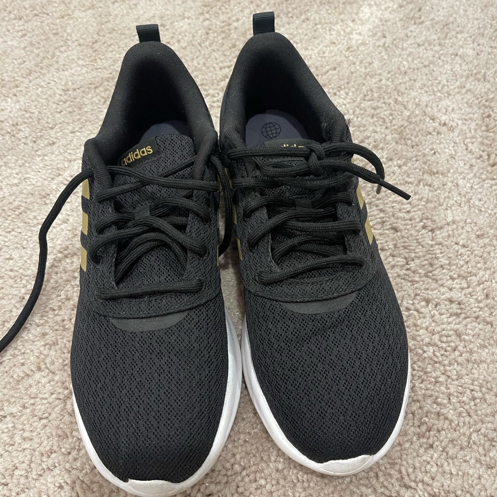 Adidas women's Black and Gold Sneakers size 10